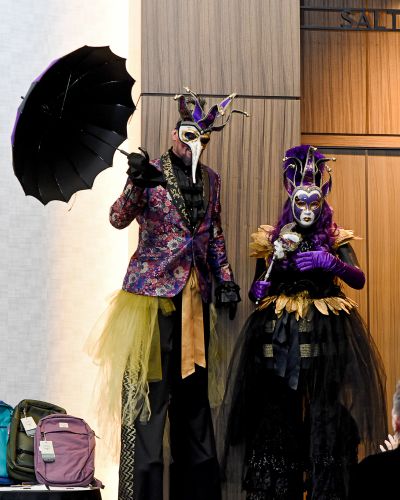 Stilt walkers in decorative masks